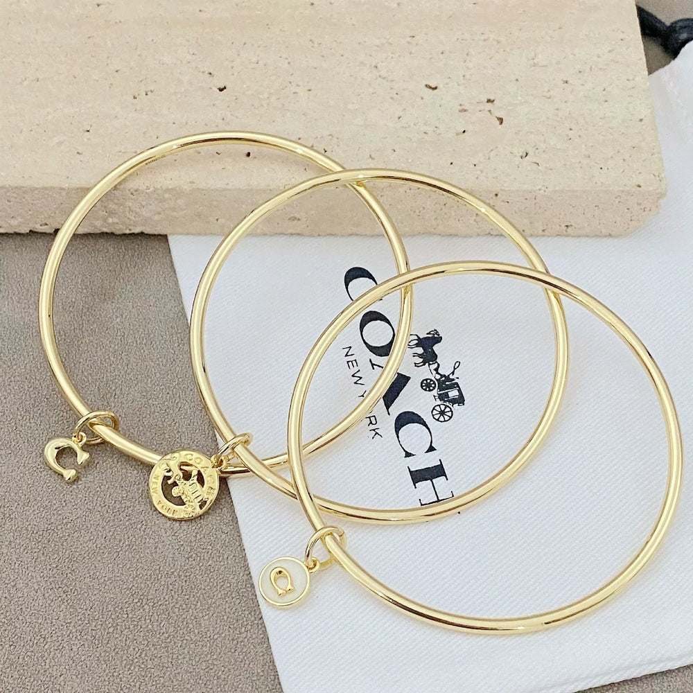 Trainer Luxe Signature Golden Halo Bangles (Set of 3)