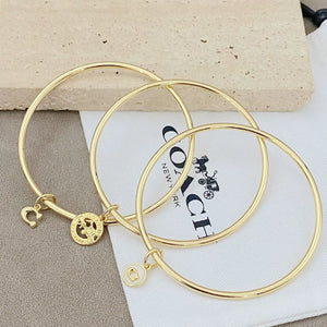Trainer Luxe Signature Golden Halo Bangles (Set of 3)