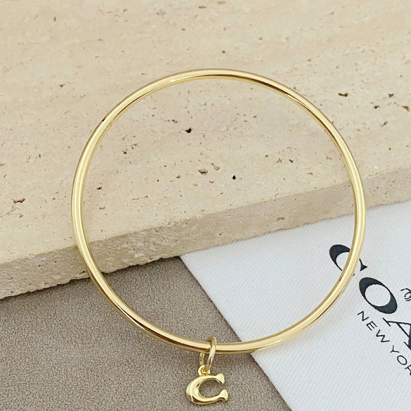 Trainer Luxe Signature Golden Halo Bangles (Set of 3)