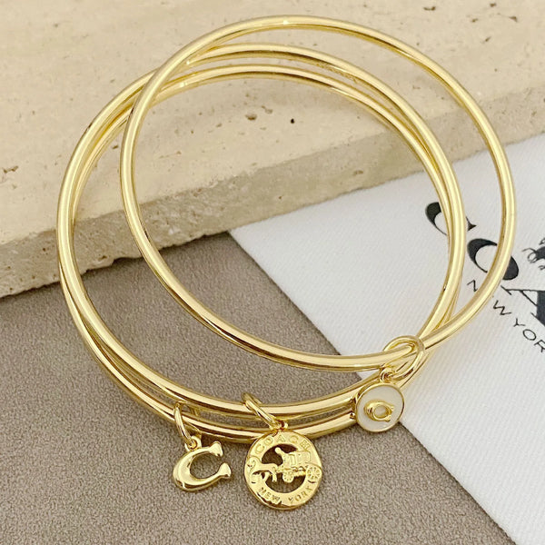 Trainer Luxe Signature Golden Halo Bangles (Set of 3)