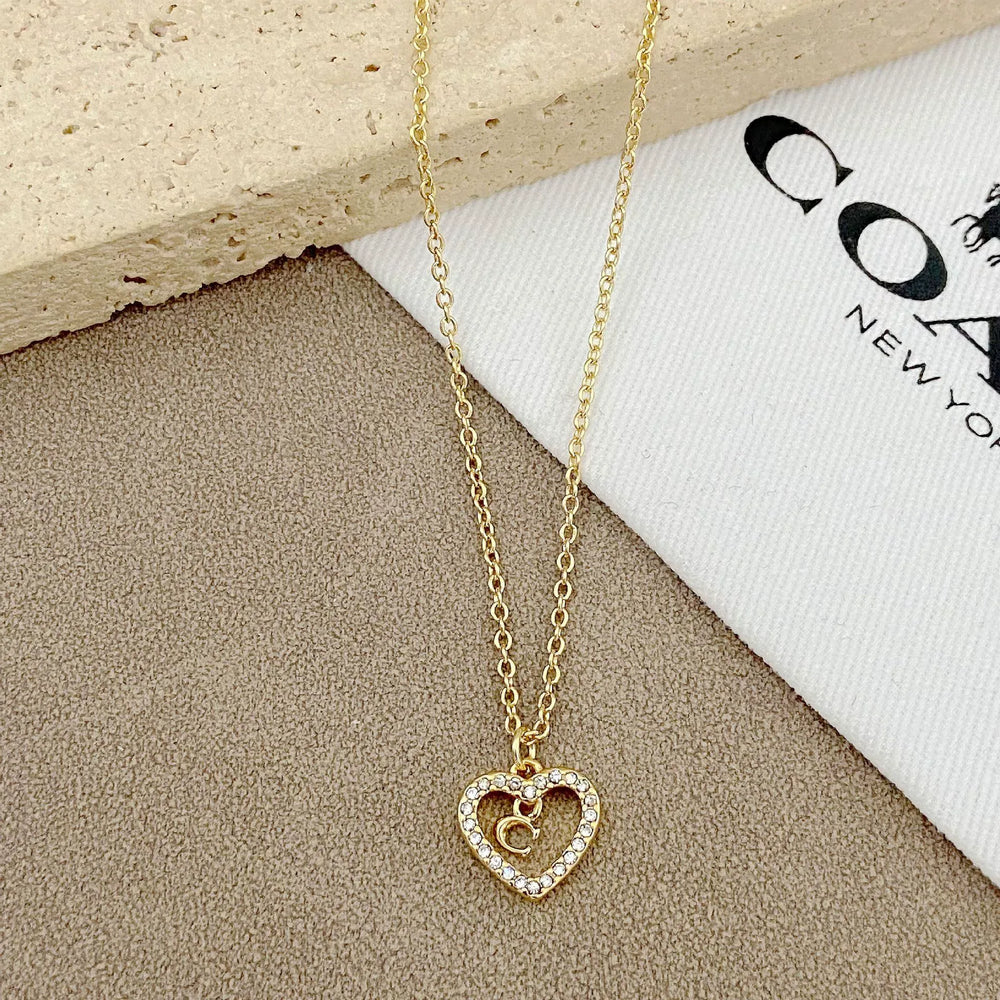 Trainer Luxe Radiant Heart Monogram Pendant