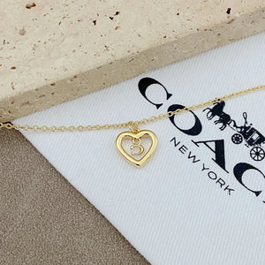 Trainer Luxe Radiant Heart Monogram Pendant