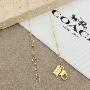 Trainer Luxe Radiant Heart Monogram Pendant