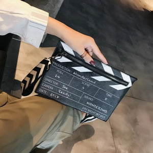 Wonderland Clapperboard Wristlet Clutch