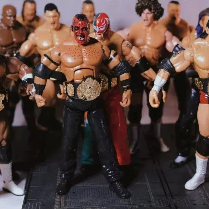 WWE action figures with a focus on a central figure holding a championship belt.
