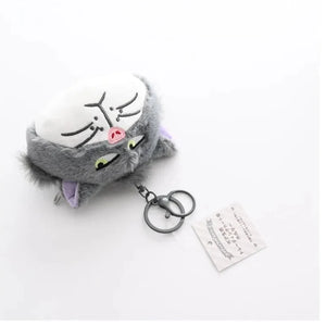 Fluffy gray cat-shaped pouch with a keychain on a white background