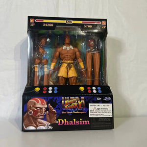 Action figure packaging of Dhalsim from Street Fighter II on a white background
