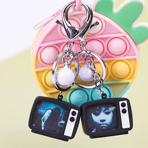 Cinema Horror TV Glow & Sound Keychain