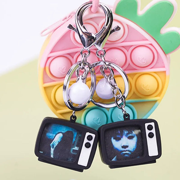 Cinema Horror TV Glow & Sound Keychain