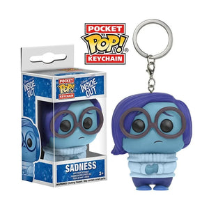 Pocket Pop! Keychain of Sadness from Inside Out with packaging on a white background